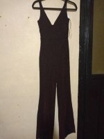 Palazzo negro con brillos rojos de Shasa de segunda mano - GoTrendier
