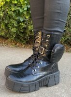 Botas negras bolsillos militares chunky de Nacional de segunda mano -  GoTrendier