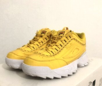 Tenis casuales Fila amarillos de segunda mano - GoTrendier