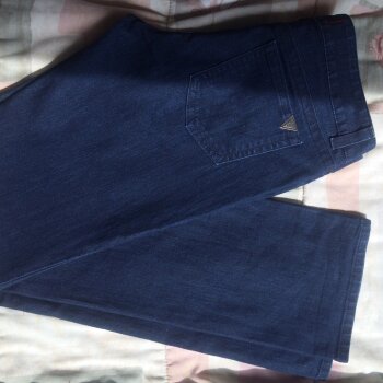Pantalones acampanados GUESS azules de mujer - GoTrendier