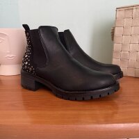 Botas negras con estoperoles de Capa de Ozono de segunda mano - GoTrendier