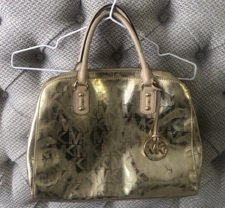Bolsa MK Dorada ✨✨ de Michael Kors de segunda mano - GoTrendier