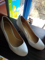 Zapatillas blancas de tacón bajo de Perugia de segunda mano - GoTrendier