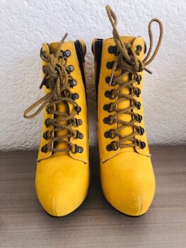Botines Andrea amarillos de segunda mano - GoTrendier