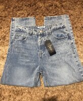 JEANS MOM CON BOLSAS - Vertiche