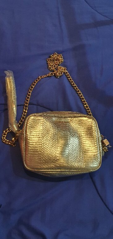 Bolsa plateada victoria de Victoria's Secret de segunda mano - GoTrendier
