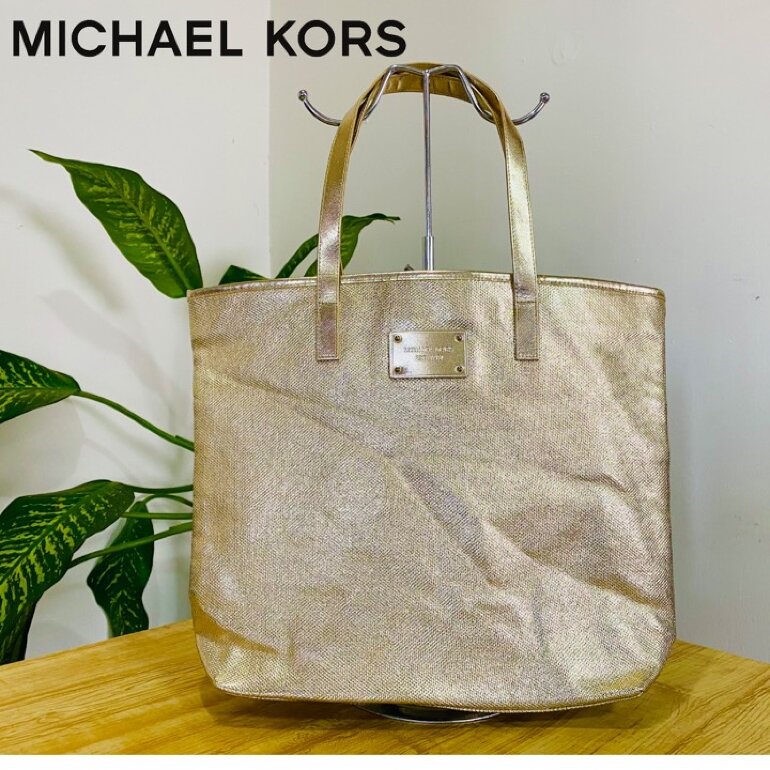Bolsa Michael Kors dorada de segunda mano - GoTrendier