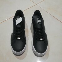 Tenis nike negros con Paloma negra de segunda mano - GoTrendier