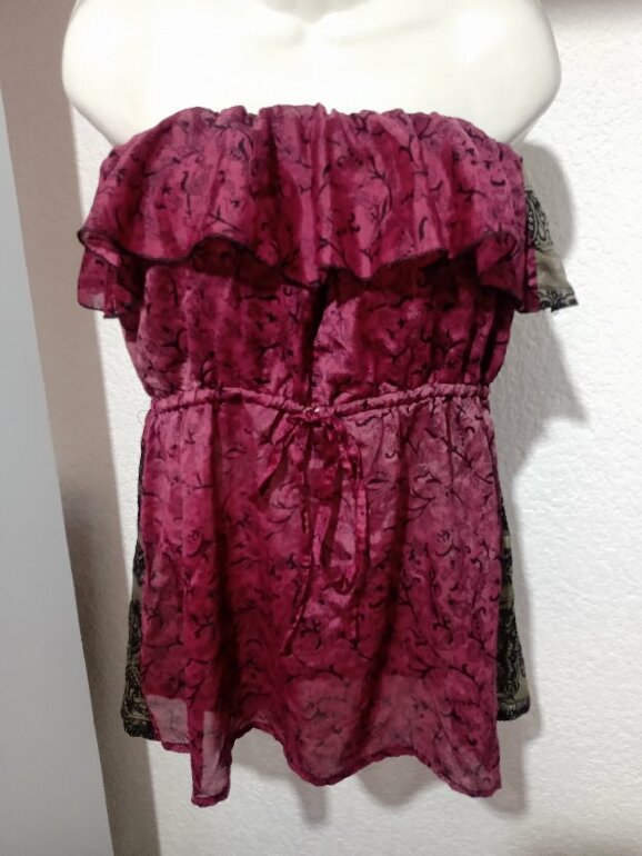 Blusa strapless con olan de Otras marcas de segunda mano GoTrendier