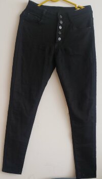 PANTALON NEGRO PROFUNDO SURPRISE de Otras marcas de segunda mano