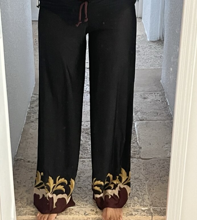 Pantalón tipo palazzo transparente de Otras marcas de segunda mano