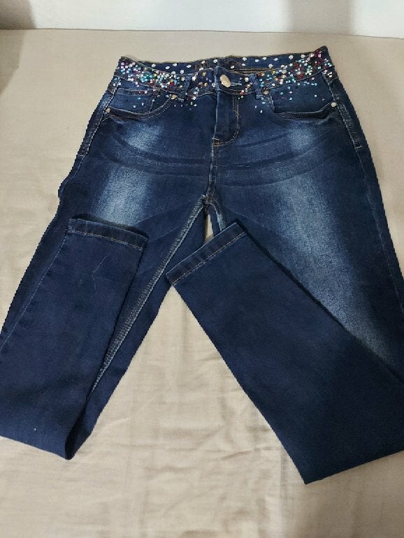 Jeans azul a la cadera con pedrería de Bonage de segunda mano