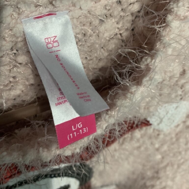 Sueter de pingüino navideño de H&M de segunda mano - GoTrendier