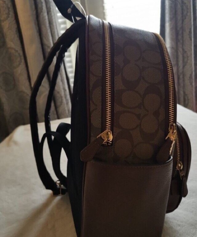 Mochila Coach color café de segunda mano GoTrendier