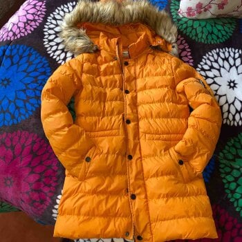 Chamarra naranja de Ann Miller de segunda mano GoTrendier