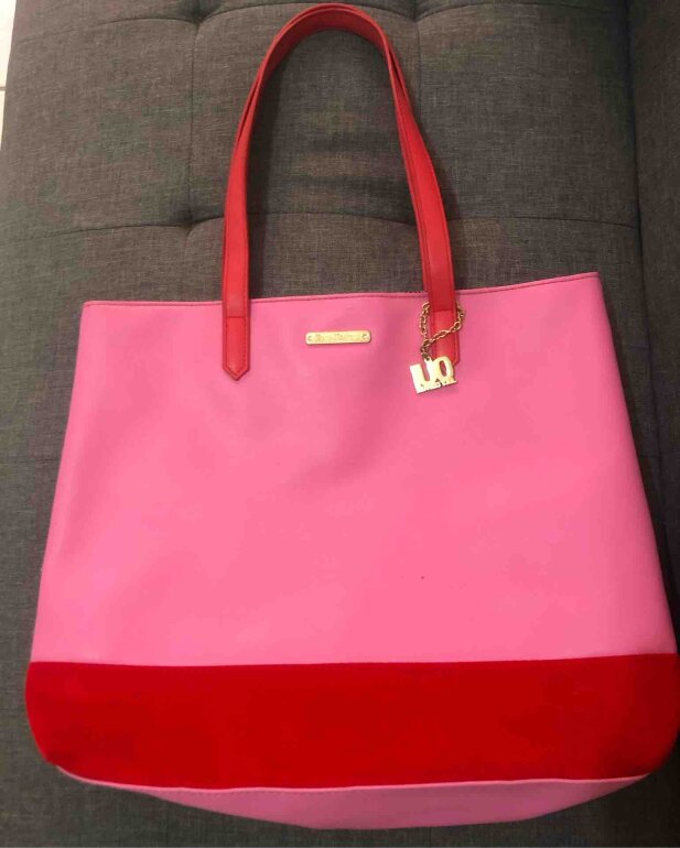 Bolsa juicy couture rosa grande de segunda mano GoTrendier