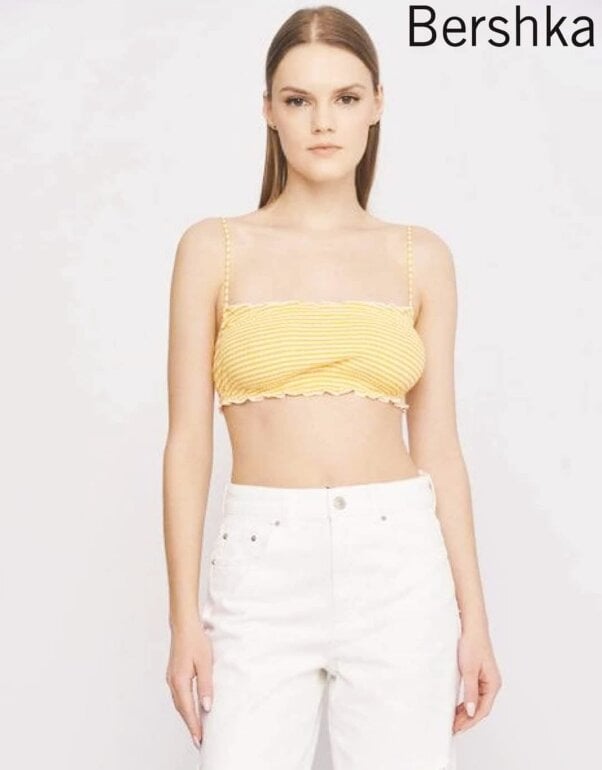 Top Bershka amarillo con líneas de segunda mano GoTrendier