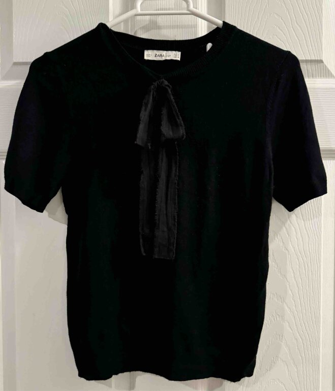 Suéter negro manga corta Zara de segunda mano GoTrendier