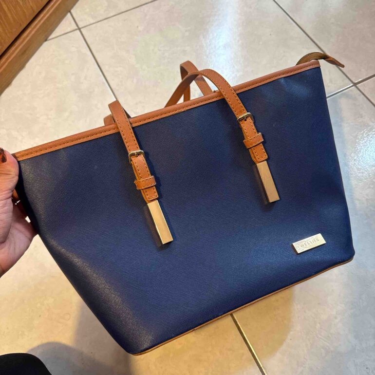 Bolsa azul westies con luz de segunda mano GoTrendier