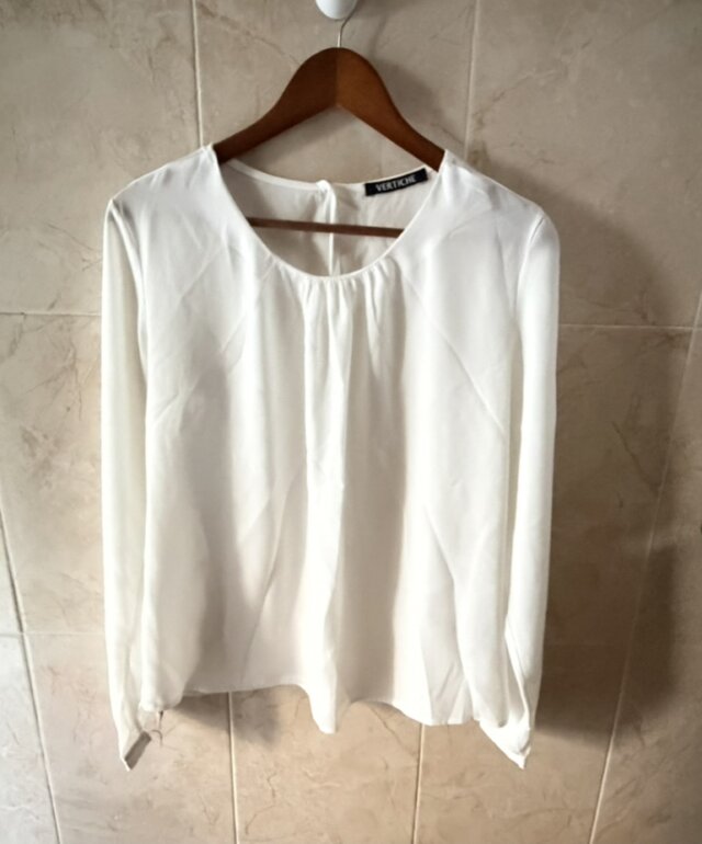 blusa blanca manga larga vertiche