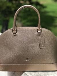 Bolsa Coach dorada nueva con etiquetas de segunda mano - GoTrendier